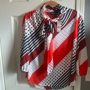 New York and Company size medium blouse, color: blood orange, black, white.